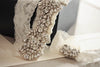Bridal garter with rhinestones on lace