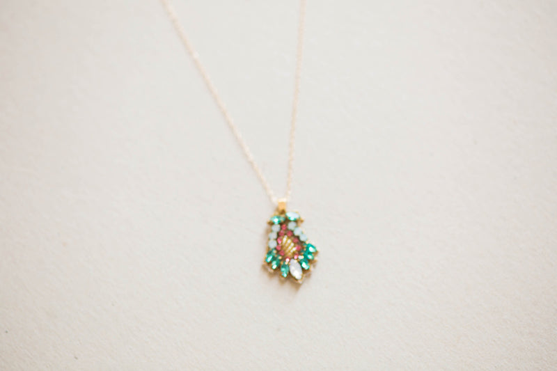 Gold charm necklace
