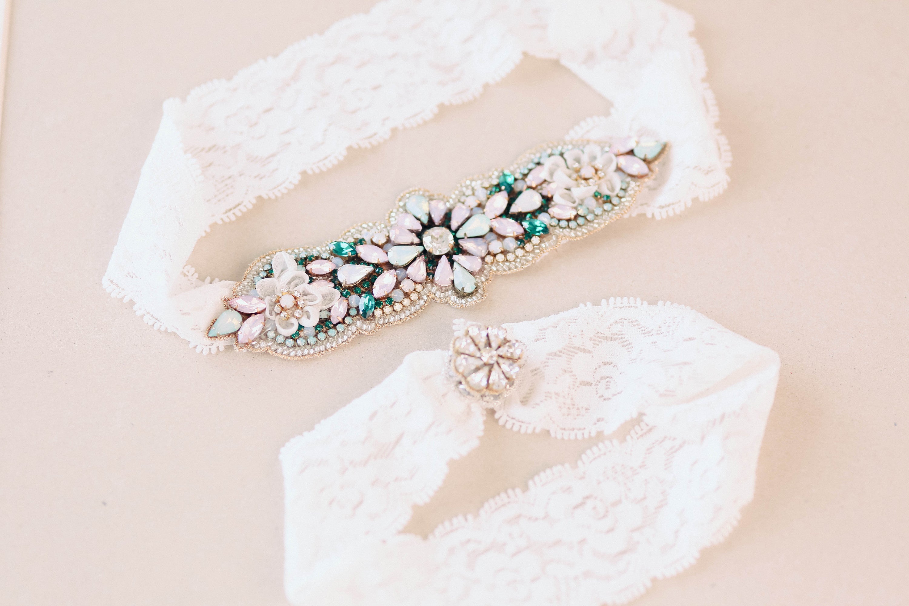 https://www.millieicaro.com/cdn/shop/products/Multicolored_Wedding_Garter_in_Green_Pink_and_Gold_-_Style_R117.jpg?v=1571438595