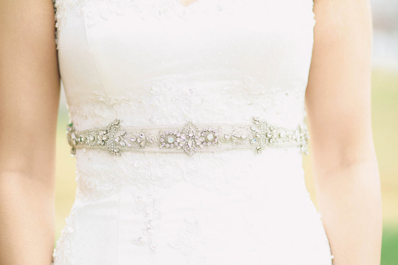 Bridal dress sash is silver and opal